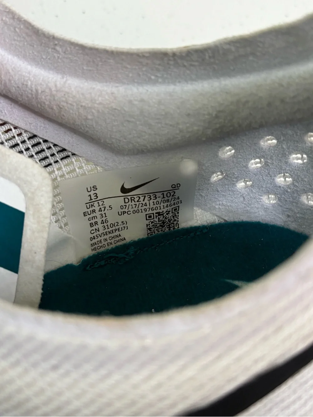 Nike Women's Mamba V6 Track Spikes with Black Swoosh and Teal Accents